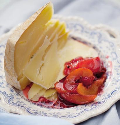 Verjuice-poached stone fruit with a wedge of cheese | Woolworths TASTE