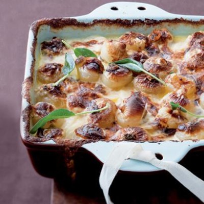 Wafer-thin potato bake with sweet baby onions