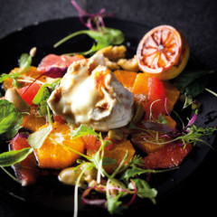 Warm goat's cheese and citrus salad with caramelised lemon dressing