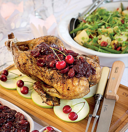 https://taste.co.za/wp-content/uploads/2015/03/whole-roast-duck-with-cherry-cinnamon-and-nutmeg-sauce-3549.jpg