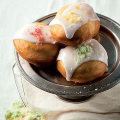 Zesty home-made doughnuts with orange drizzle