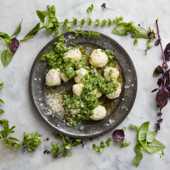 Homemade ricotta gnocchi with basil-and-celery leaf pesto