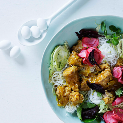 pickled fish with noodles and pink pickled radishes