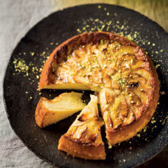 All-in-one pistachio cake topped with sliced apple