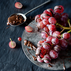 Frozen grapes with dark chocolate