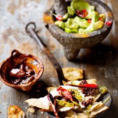 Mexican nachos with chunky guacamole