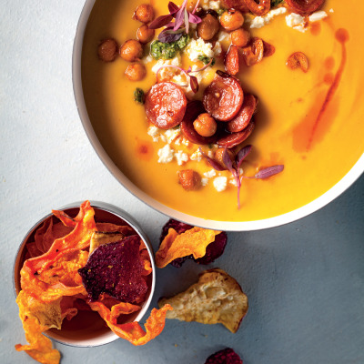 Butternut soup with chorizo, chickpea and feta topping