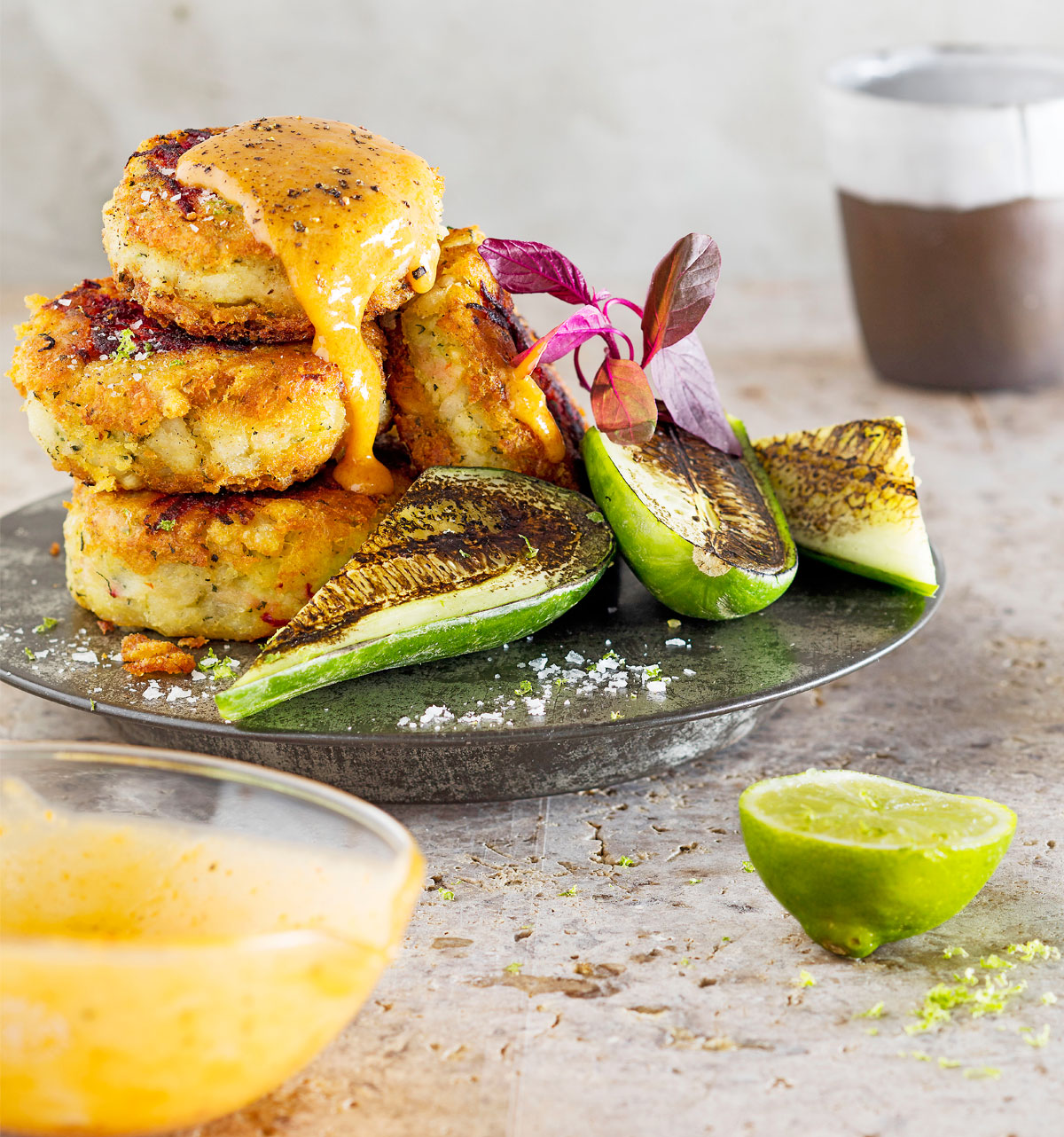 Fish cakes with seared cucumber and satay sauce Woolworths TASTE