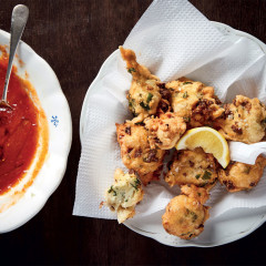 Pettole (spinach-and-cauliflower fritters) with pomodoro sauce
