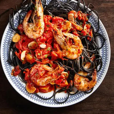 Squid ink pasta and prawns all'amatriciana | Woolworths TASTE