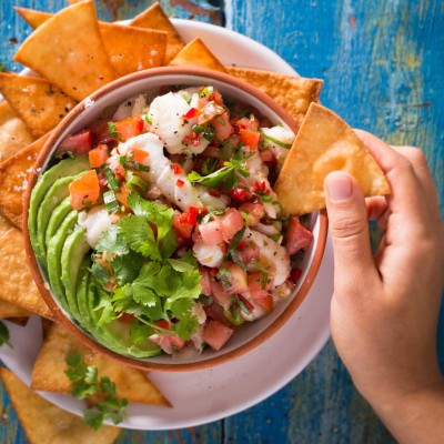 Ceviche with avocado and home-made tortilla chips