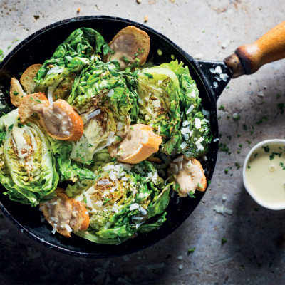 Not-quite-a-Caesar salad with charred gem lettuce and anchovy toast