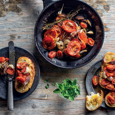 Slow poached tomatoes in garlic and anchovy oil
