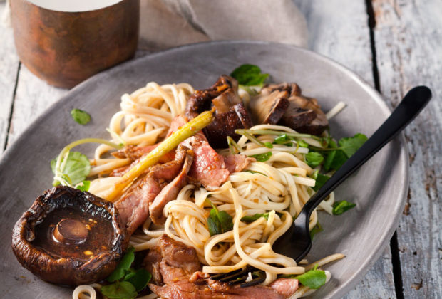 Roast marinated steak with mushrooms and green noodles recipe