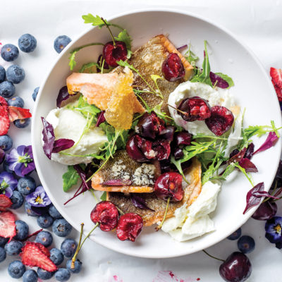 Seared trout with buffalo mozzarella, cherries and gingered honey sauce