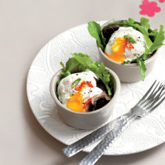 Hot Turkish eggs with brown mushrooms
