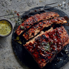 Sticky pot-braaied ribs in beer with chilli-and-mint salsa