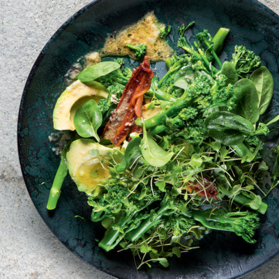Tenderstem broccoli, avocado and bacon dressed with warm anchovy butter