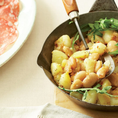 Warm potato and bean salad with assorted cold cuts