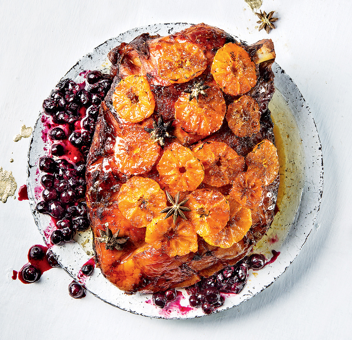 Naartjie-glazed gammon with blueberries and star anise recipe
