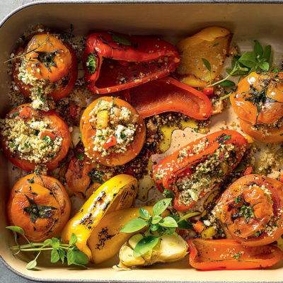 Herby couscous-stuffed tomatoes and peppers