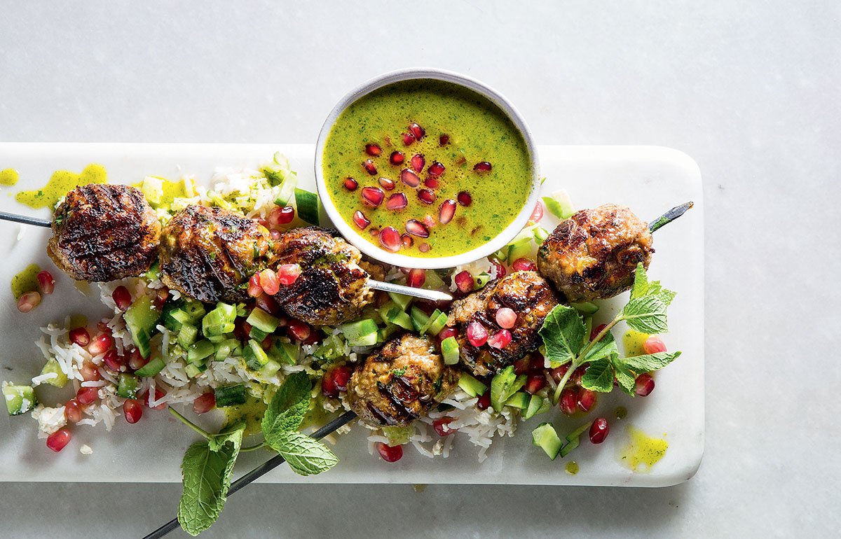 Bobotie kebabs with pomegranate-and-almond rice salad recipe