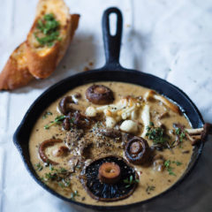 Mushrooms with roasted garlic cream and herb-buttered toast