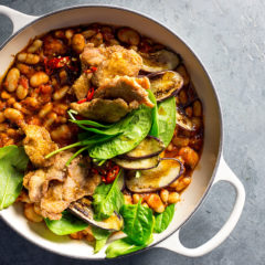 Spicy Spanish beans with crispy pork fillet