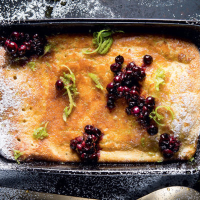 Zested oven pancake with warm blueberries
