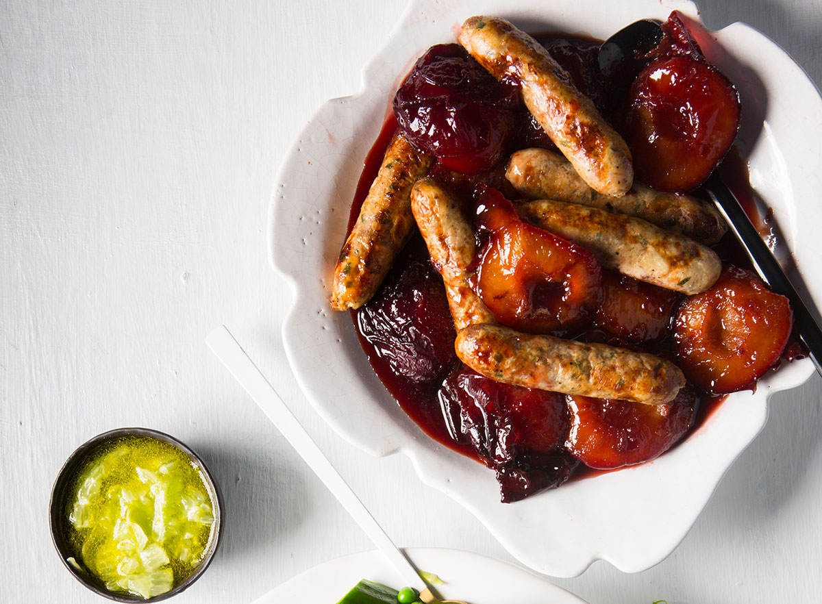 Duck sausages & vino cotto poached plums recipe | TASTE
