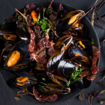 Cider mussels with duck bacon