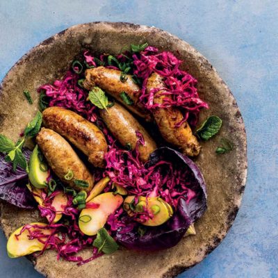 Beef sausages with purple cabbage-and-apple slaw