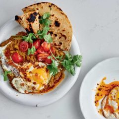 Spicy fried eggs on dhal with yoghurt-sumac sauce