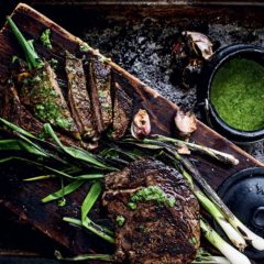 Steak with chargrilled spring onion butter