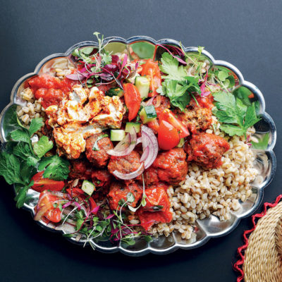 Spicy pilchard frikkadels with pearl barley and tomato salsa