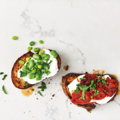 Sourdough toast with roast tomatoes, broad beans, goat's cheese and mint