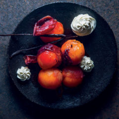 Spicy poached plums with whipped crème fraîche