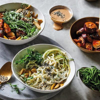 Spinach-and-cauliflower noodles with macadamia yoghurt-and-green olive sauce and caponata-style brinjals