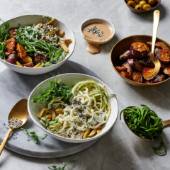 Spinach-and- cauliflower noodles with macadamia yoghurt-and-green olive sauce and caponata-style brinjals
