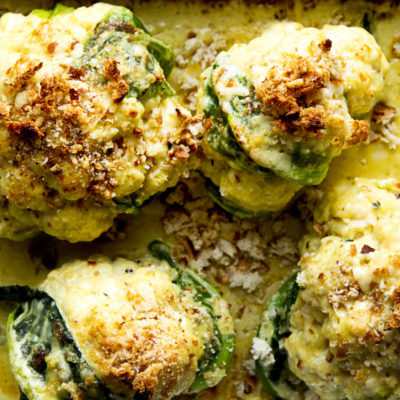 Whole roasted cauliflower with 3-cheese sauce