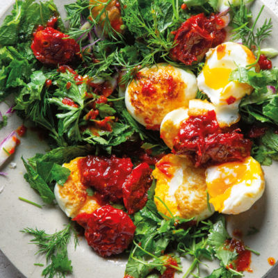 Crispy twice-cooked eggs with sambal oelek and herb salad