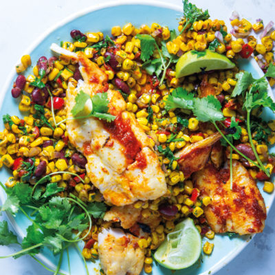 Harissa hake with corn and beans