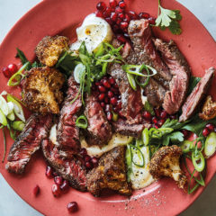 Steak with Southern-spiced cauliflower and pomegranate-spring onion yoghurt