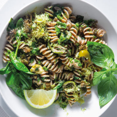 Wholewheat fusilli with green olives and herbs
