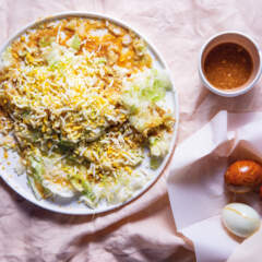 Smashed cabbage with smoked eggs