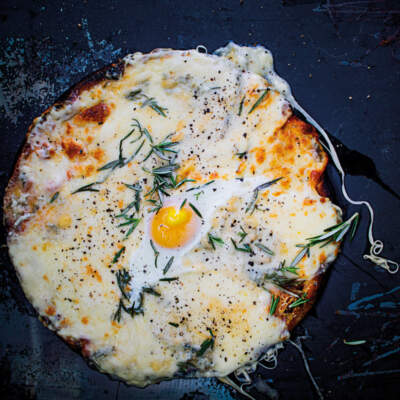 Four-cheese, egg and herb pizza