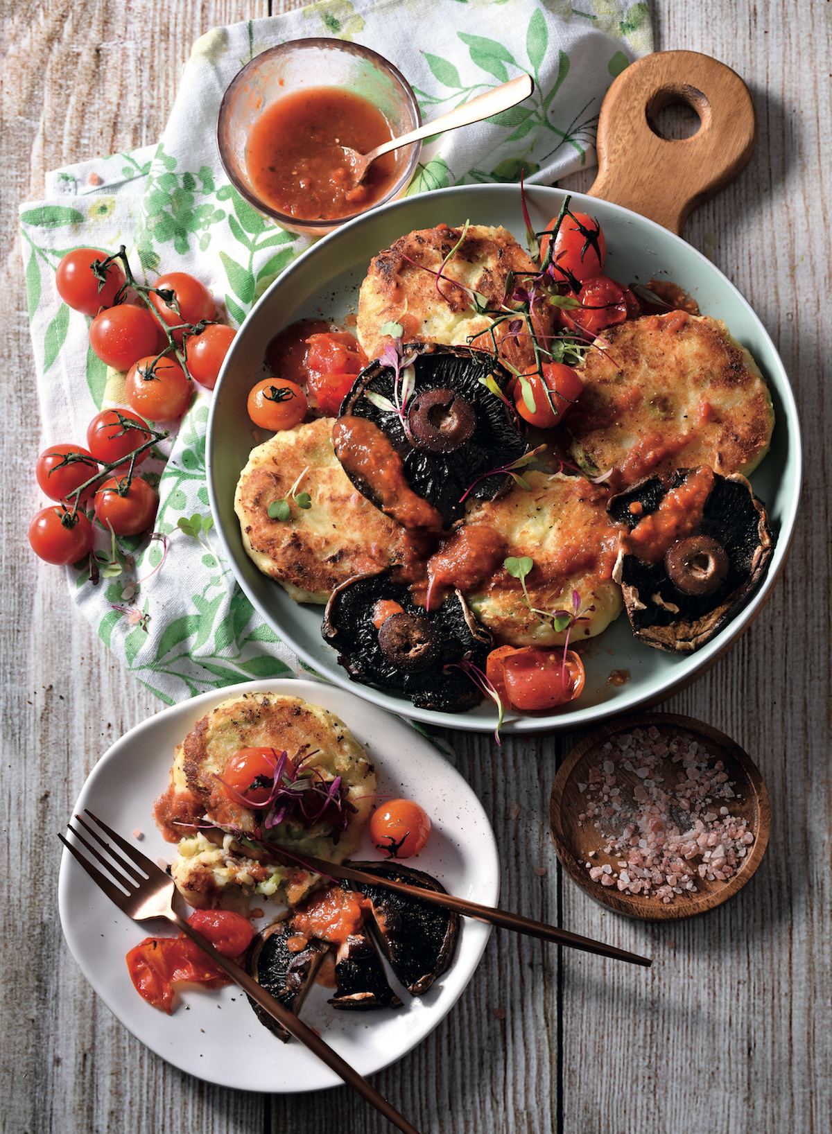potato cakes with tomatoes and mushrooms