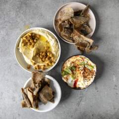 Trout skins with easy hummus and spicy labneh 