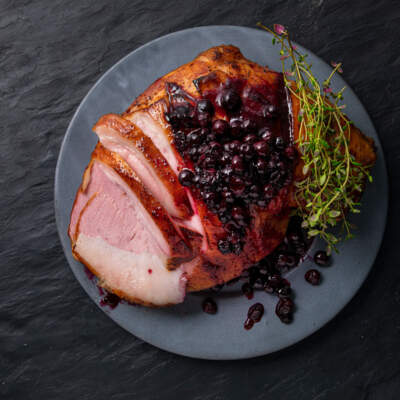 Glazed gammon with blueberries and honey