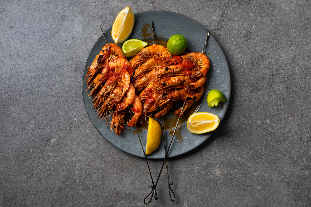 Braaied prawn skewers with harissa